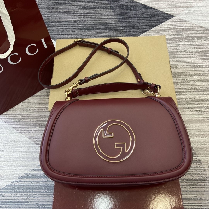 G*u*i top handle bags